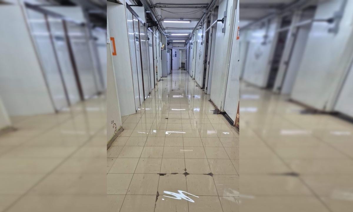 Chuva forte transborda bueiro e deixa corredores do HRT inundados